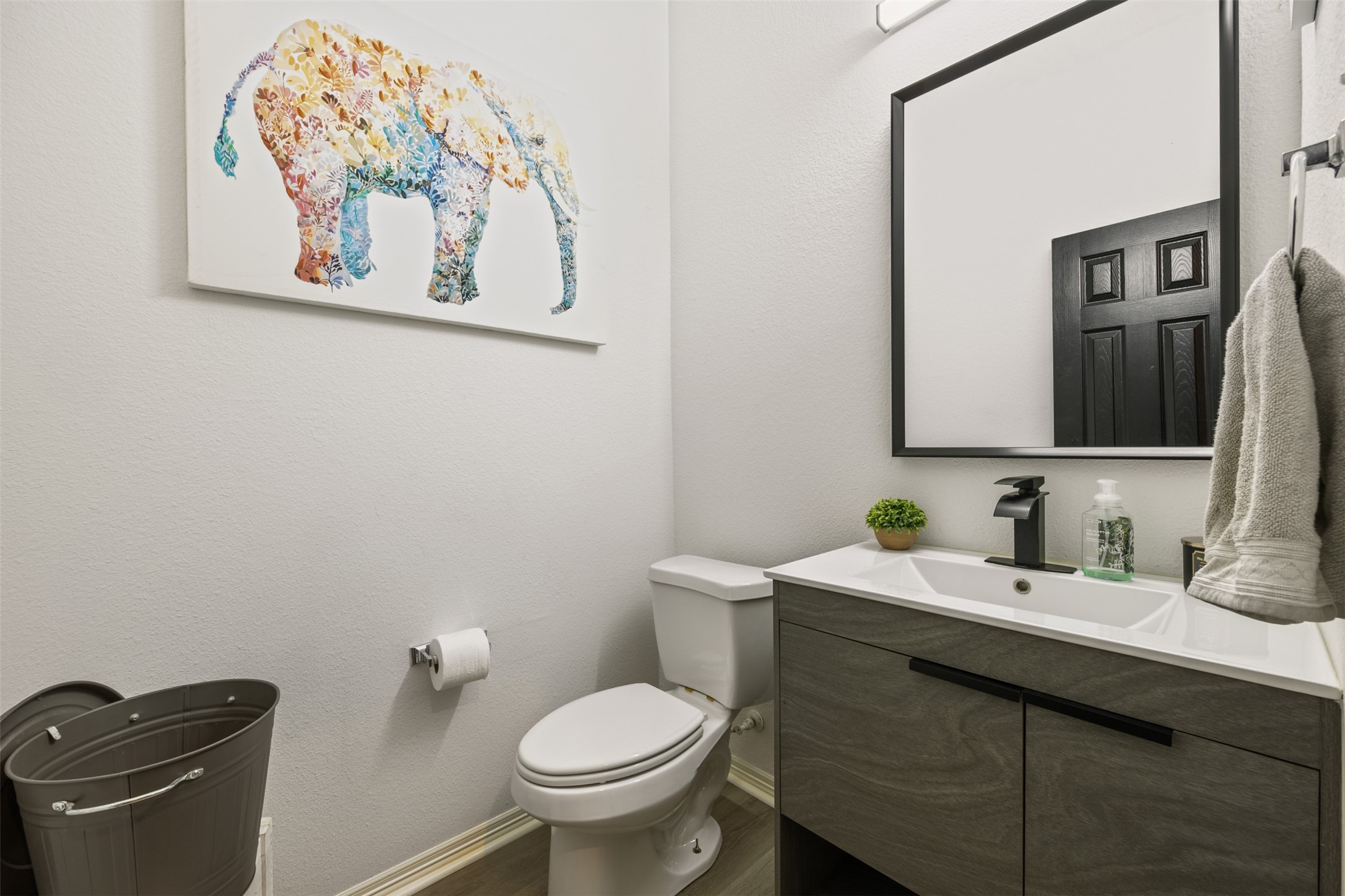 58 South Longsford Circle Spring, TX 77382 - Photo 44 of 50 a bathroom with a toilet sink and mirror