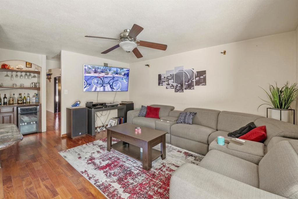 9715 Kenesaw Court Santee, CA 92071 - Photo 13 of 36 a living room with furniture and wooden floor
