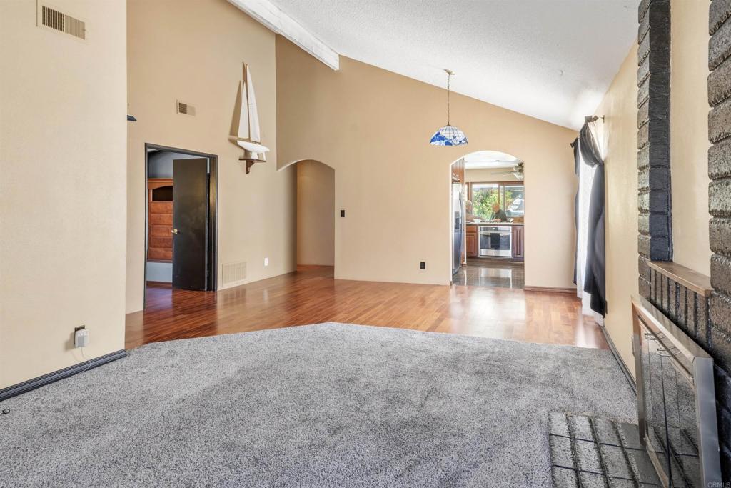 9715 Kenesaw Court Santee, CA 92071 - Photo 7 of 36 wooden floor in an empty room with a window