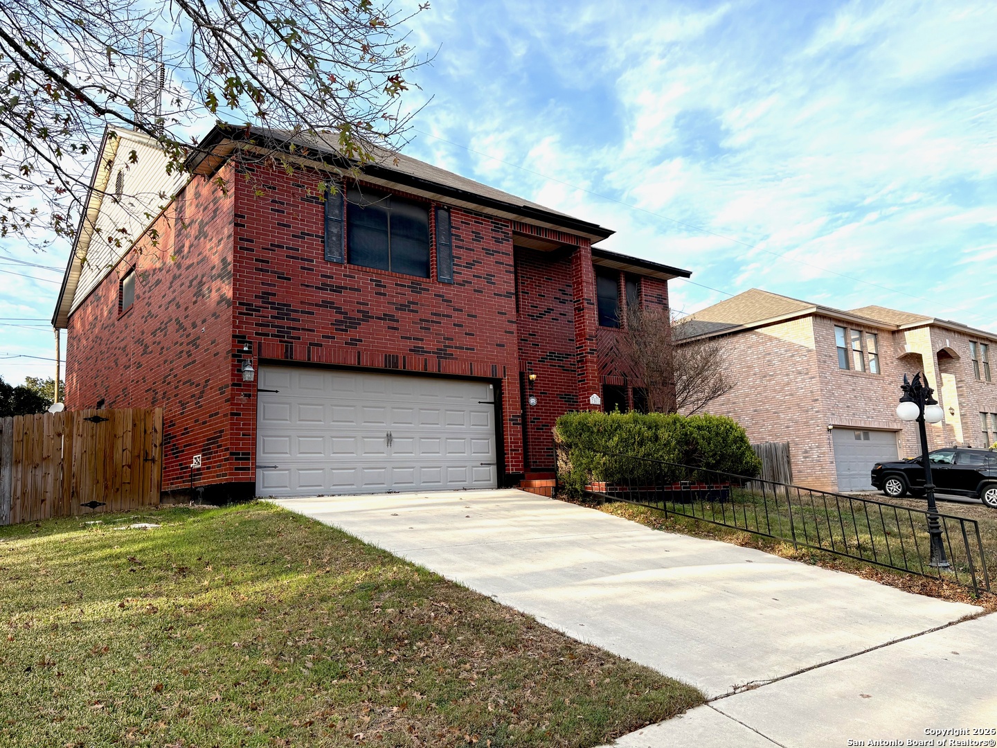 7501 Avery Road Live Oak, TX 78233 - Photo 1 of 32 a front view of a house with a yard