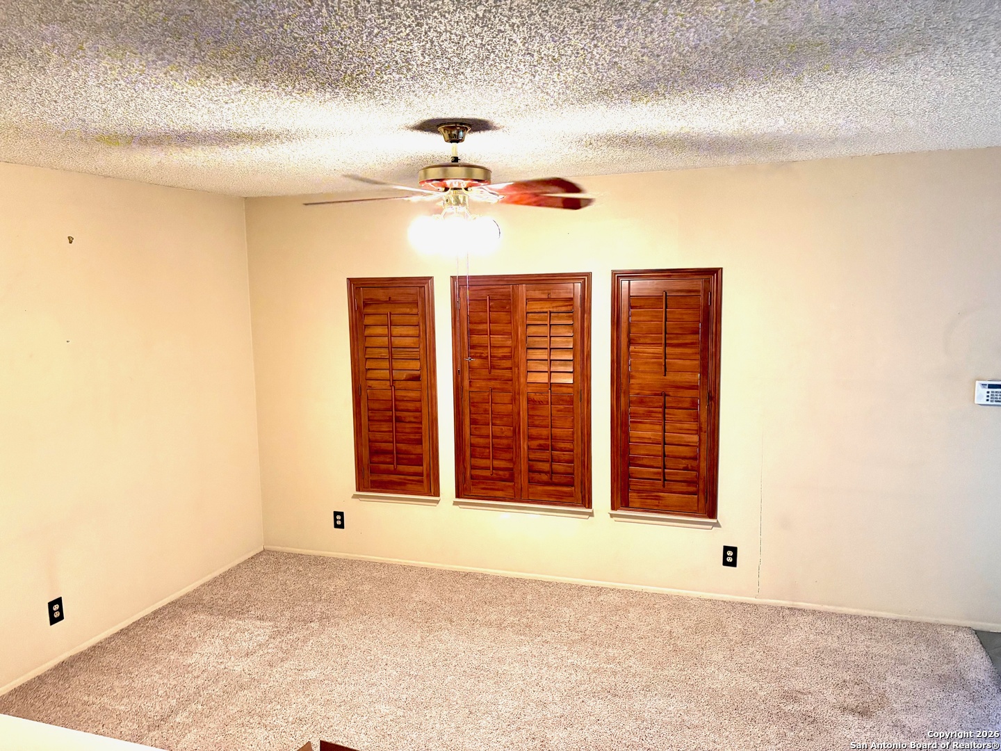 7501 Avery Road Live Oak, TX 78233 - Photo 13 of 32 a view of an empty room with a window