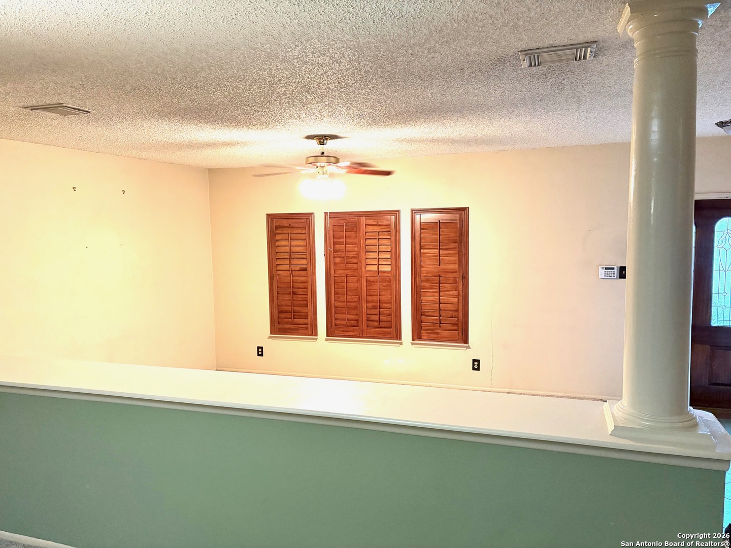 7501 Avery Road Live Oak, TX 78233 - Photo 14 of 32 a view of an empty room with a window