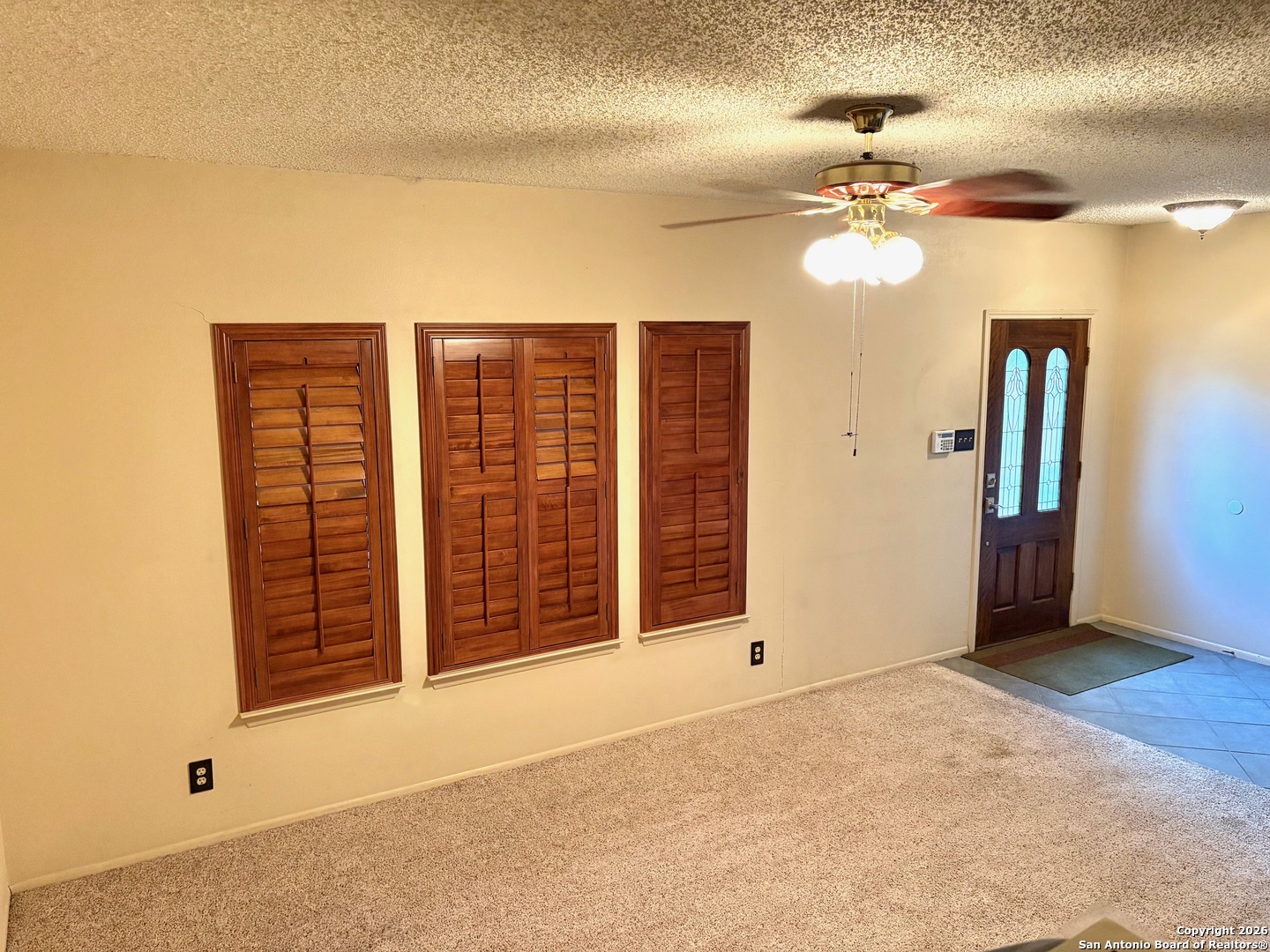 7501 Avery Road Live Oak, TX 78233 - Photo 17 of 32 a view of an empty room with a window