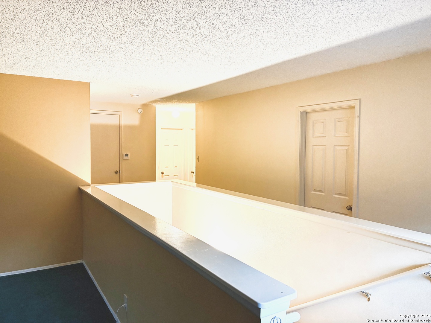 7501 Avery Road Live Oak, TX 78233 - Photo 28 of 32 a bathroom with a sink and a bathtub