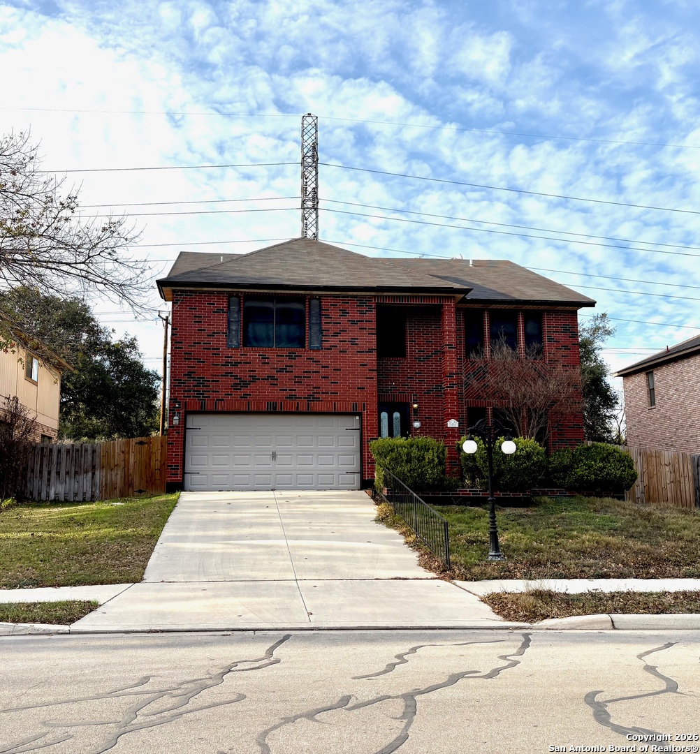 7501 Avery Road Live Oak, TX 78233 - Photo 32 of 32 a front view of a house with garden