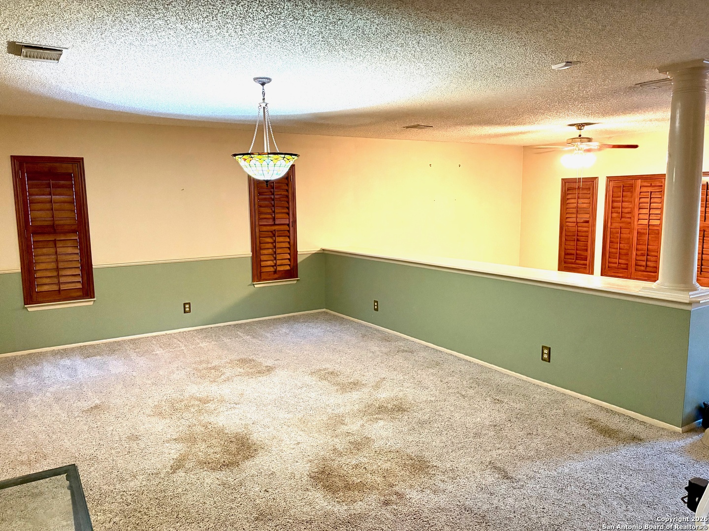 7501 Avery Road Live Oak, TX 78233 - Photo 5 of 32 a room with window and ceiling fan