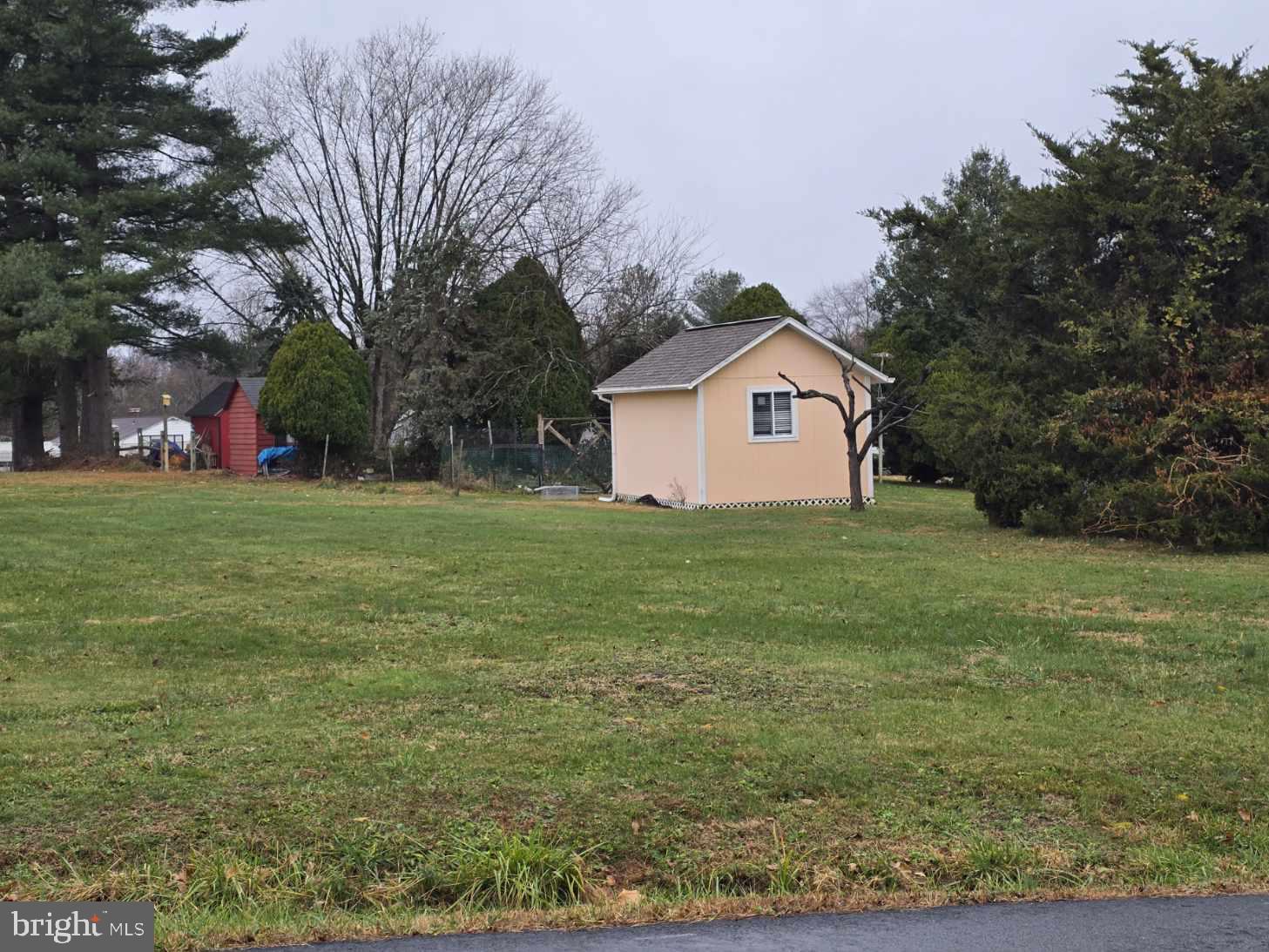 8333 Grove Angle Road Ellicott City, MD 21043 - Photo 3 of 14 a view of a house with a yard