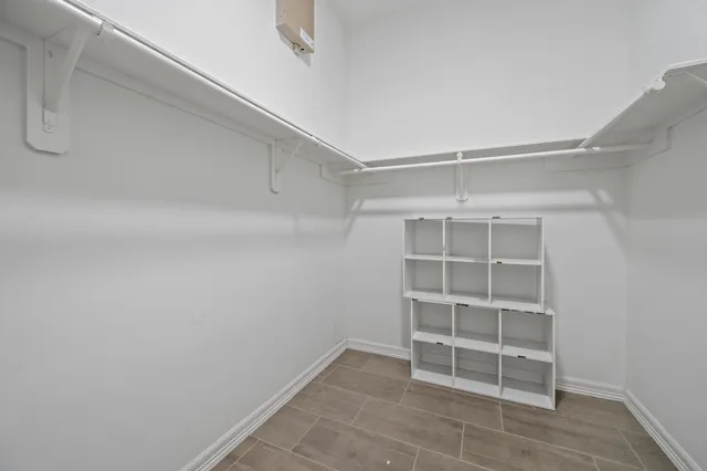 a view of an empty walk in closet
