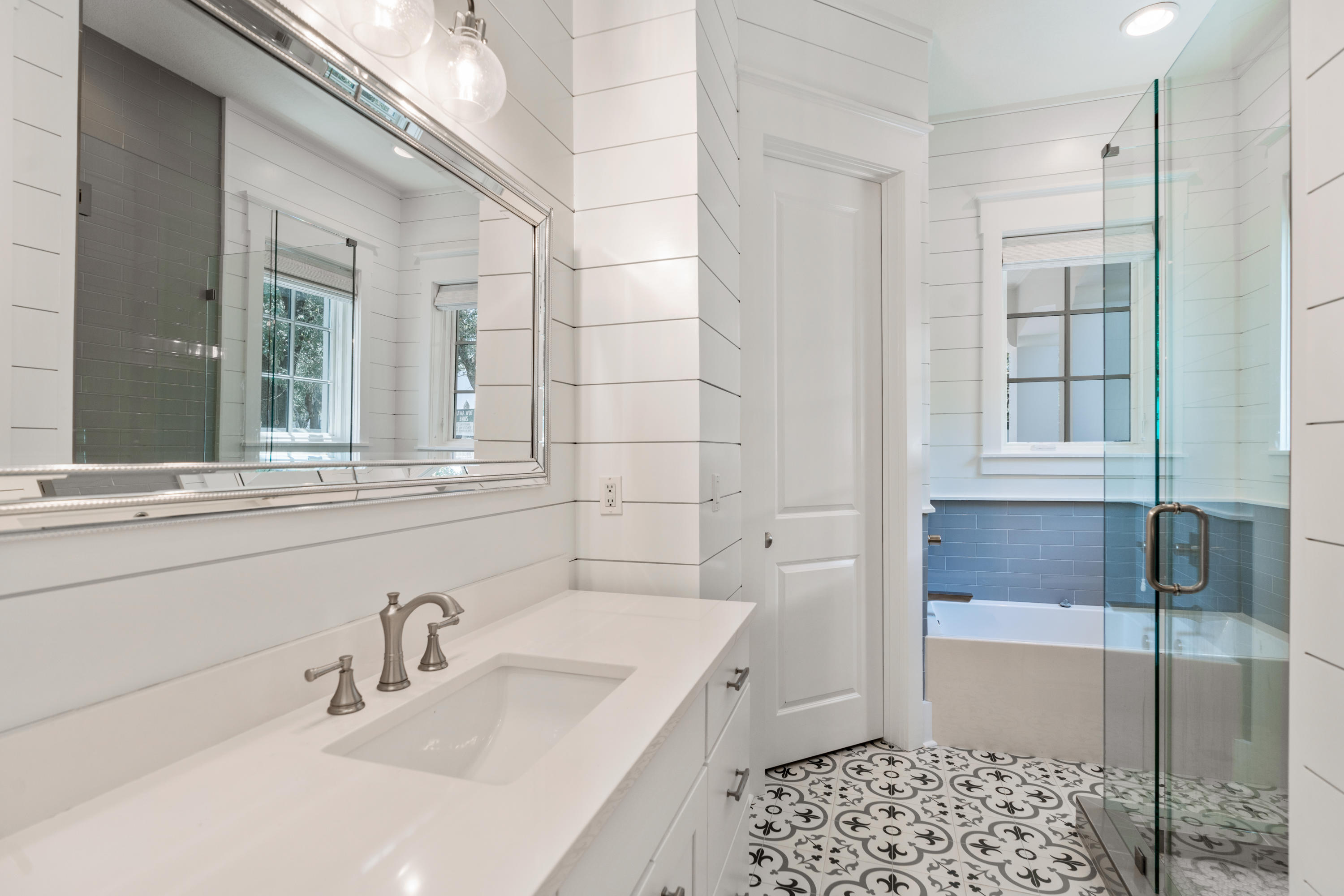 98 Pine Crest Circle Inlet Beach, FL 32461 - Photo 16 of 66 a bathroom with a sink and a bathtub