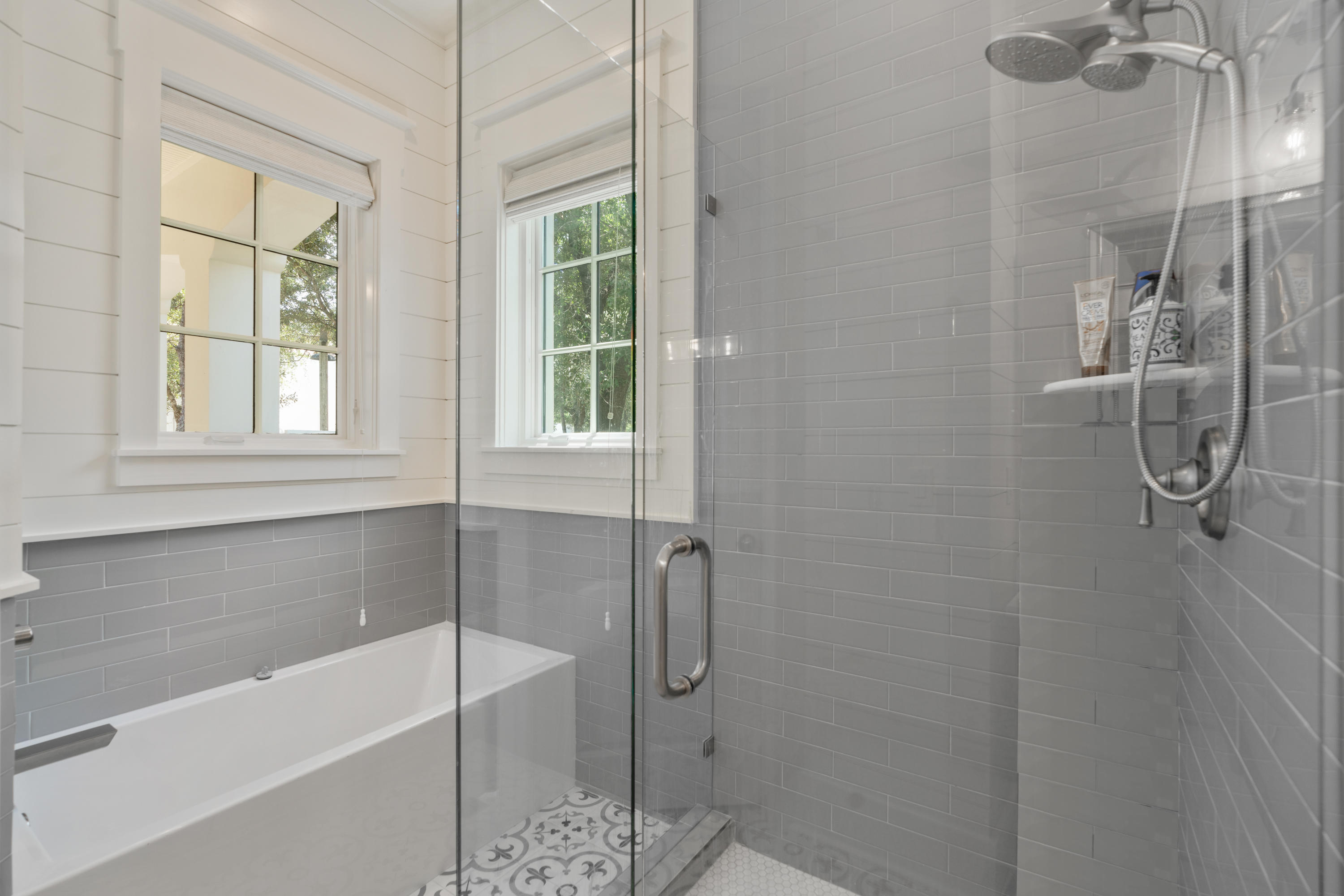 98 Pine Crest Circle Inlet Beach, FL 32461 - Photo 17 of 66 a bathroom with a bath tub with a shower