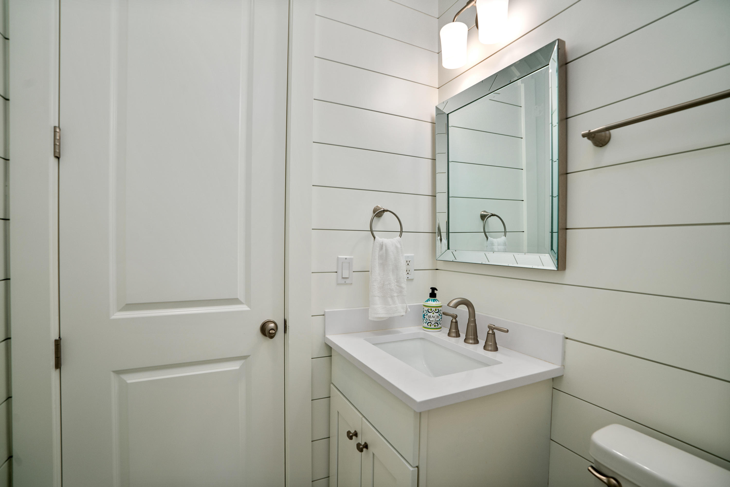 98 Pine Crest Circle Inlet Beach, FL 32461 - Photo 20 of 66 a bathroom with a sink toilet and vanity