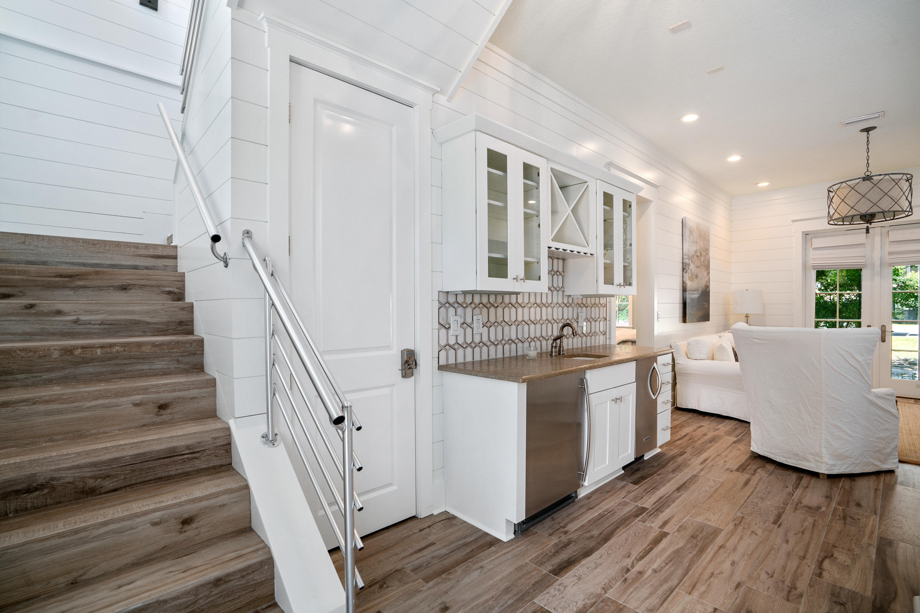 98 Pine Crest Circle Inlet Beach, FL 32461 - Photo 22 of 66 a kitchen with sink cabinets and wooden floor