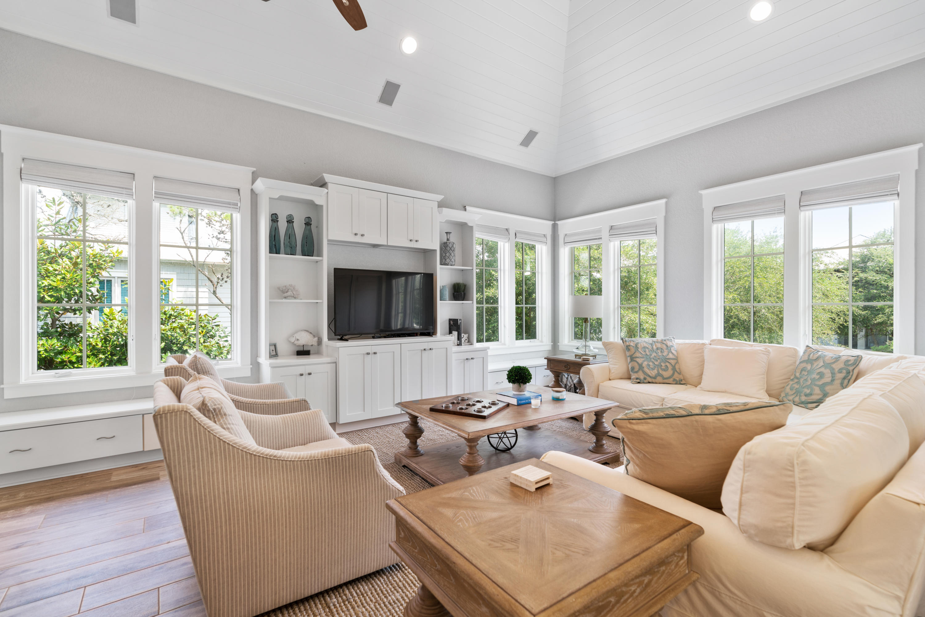 98 Pine Crest Circle Inlet Beach, FL 32461 - Photo 24 of 66 a living room with furniture flat screen tv and a large window