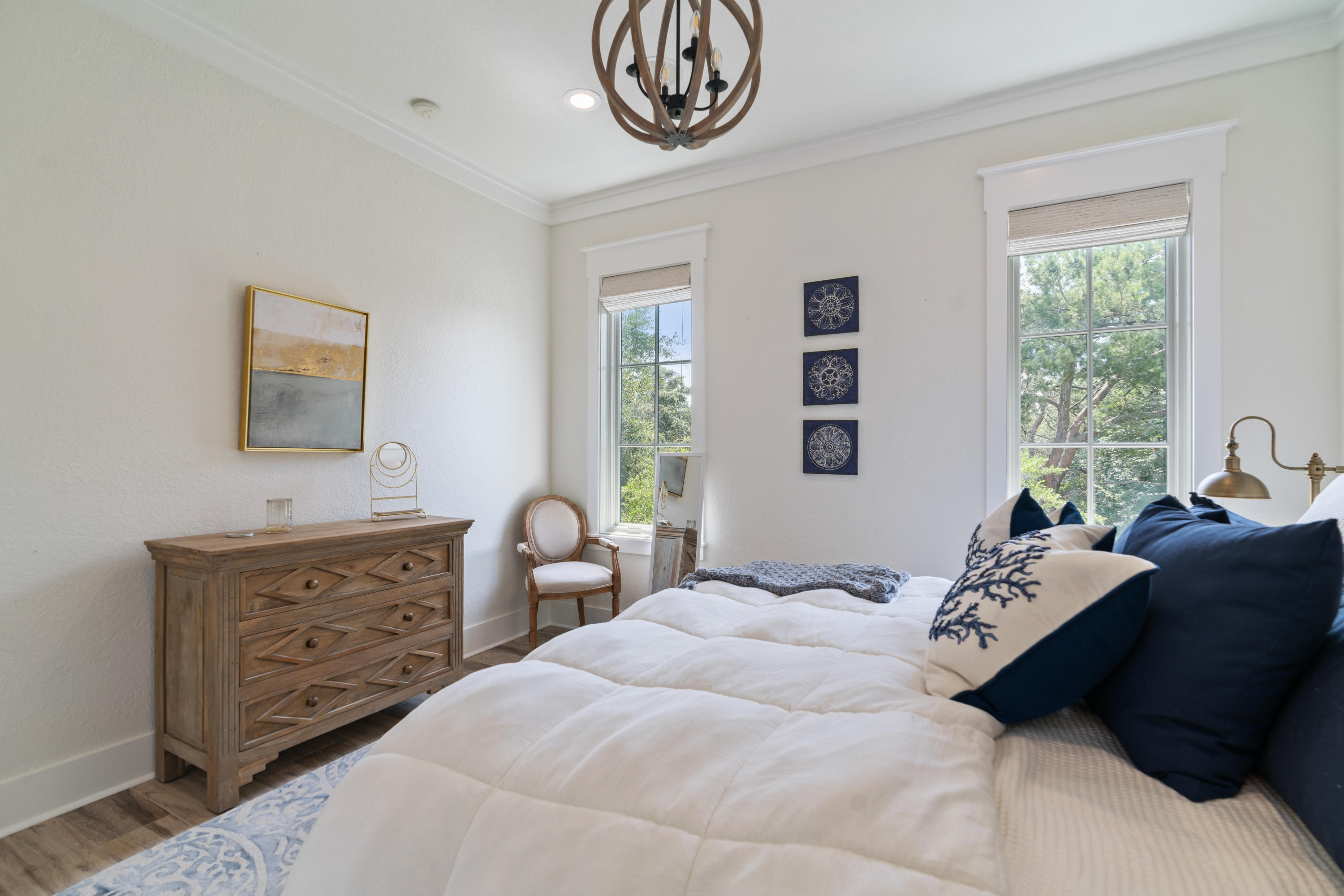 98 Pine Crest Circle Inlet Beach, FL 32461 - Photo 36 of 66 a bedroom with a bed and a dresser