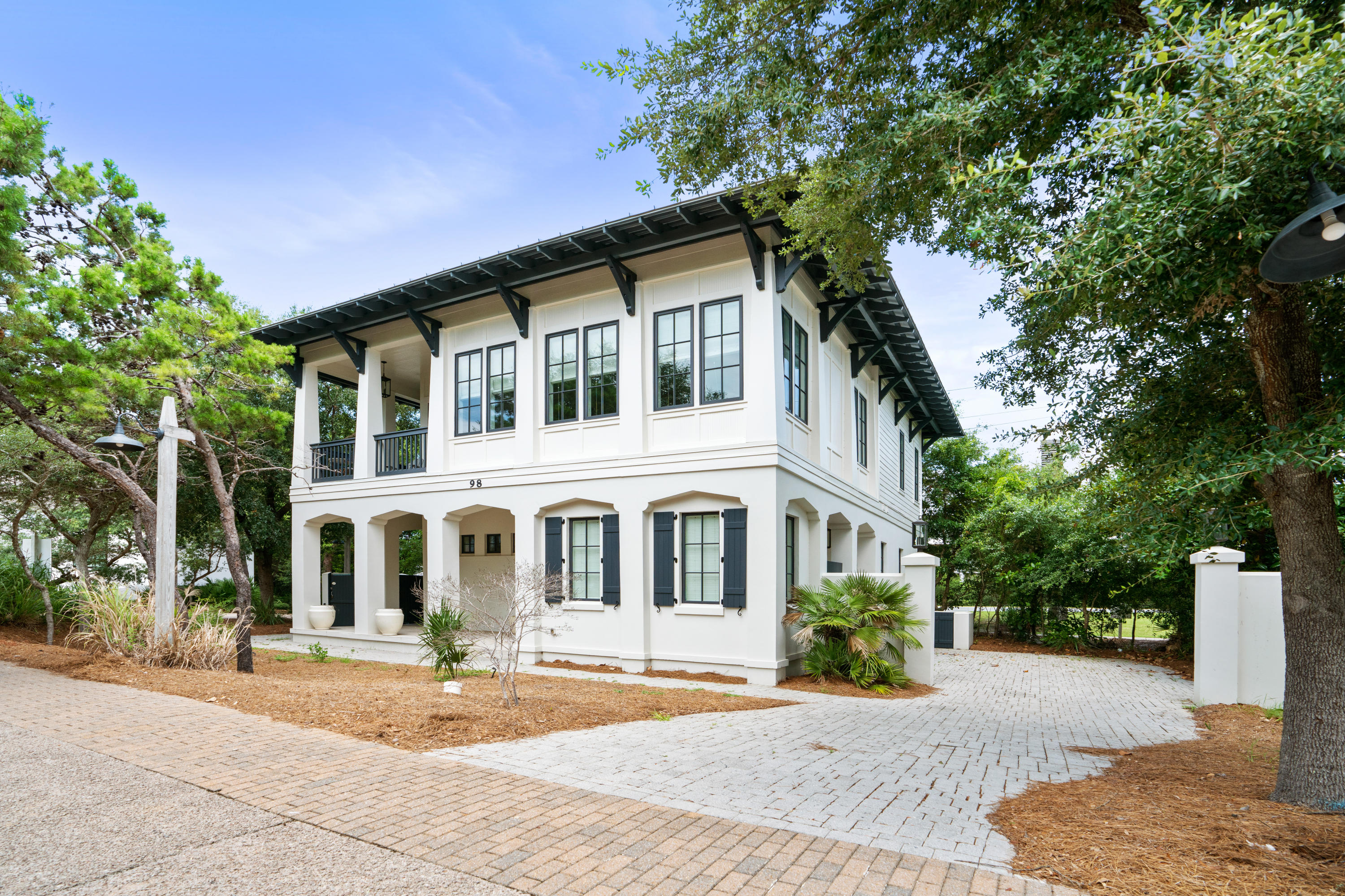 98 Pine Crest Circle Inlet Beach, FL 32461 - Photo 4 of 66 a front view of a house with a yard