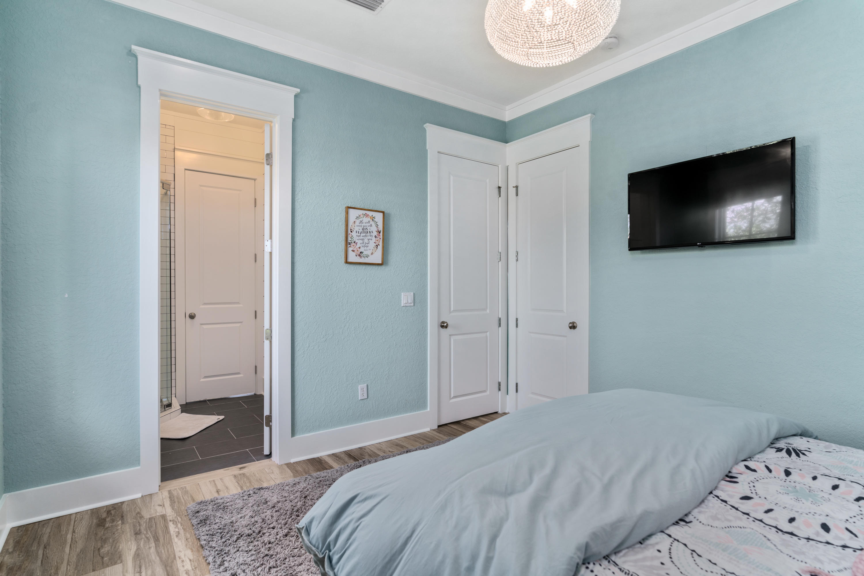 98 Pine Crest Circle Inlet Beach, FL 32461 - Photo 41 of 66 a bedroom with a bed and a television