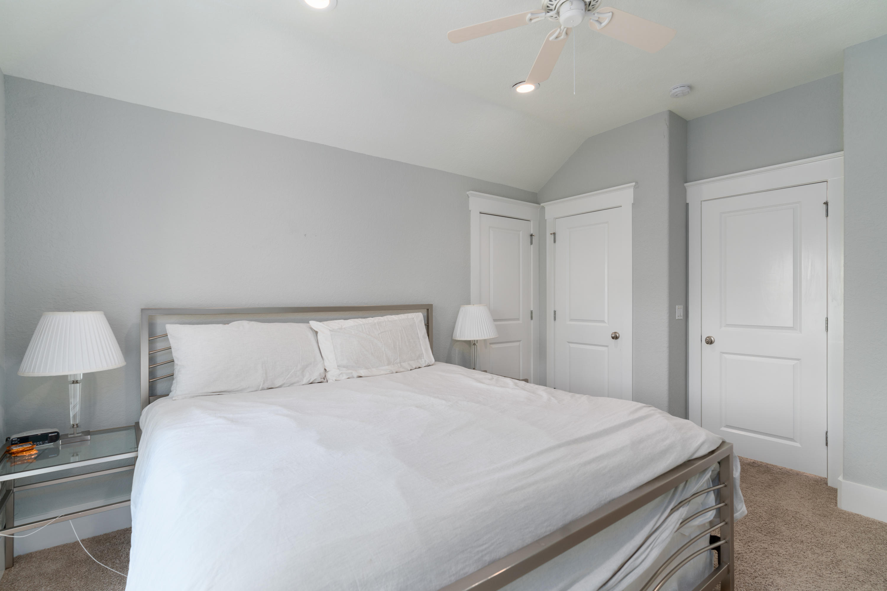 98 Pine Crest Circle Inlet Beach, FL 32461 - Photo 46 of 66 a bedroom with a bed and a lamp