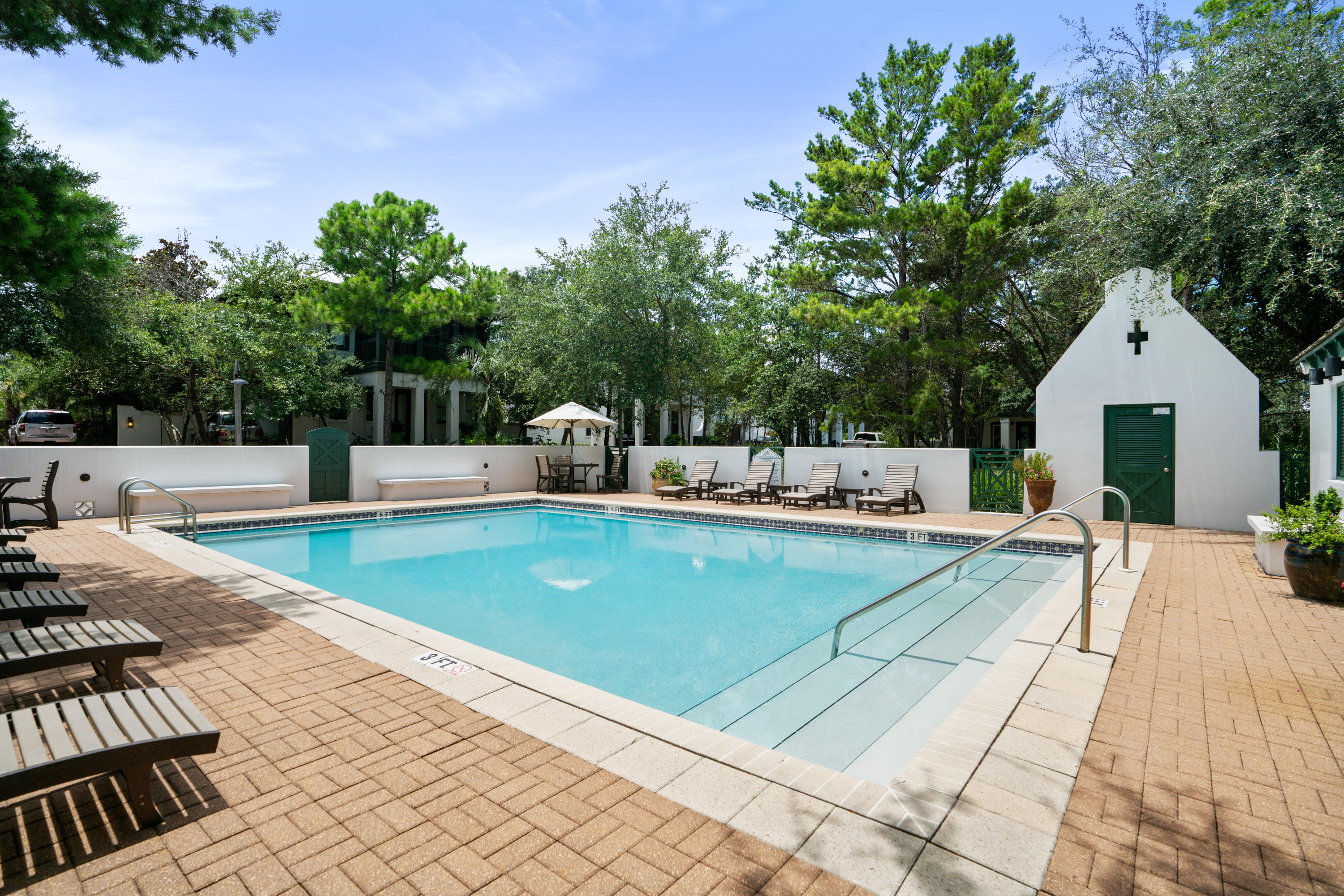 98 Pine Crest Circle Inlet Beach, FL 32461 - Photo 51 of 66 a view of a patio with swimming pool