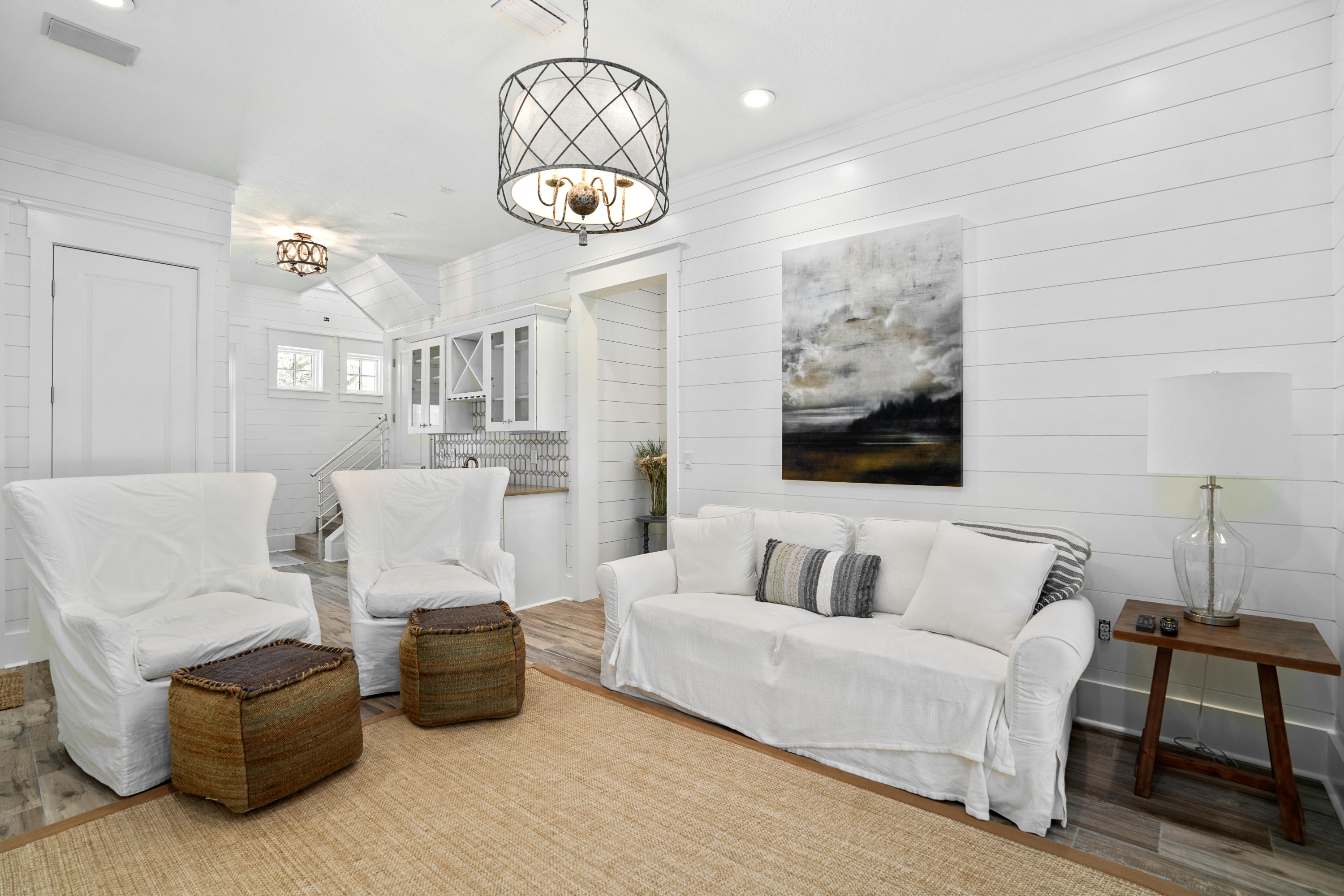 98 Pine Crest Circle Inlet Beach, FL 32461 - Photo 6 of 66 a living room with furniture chandelier and a table