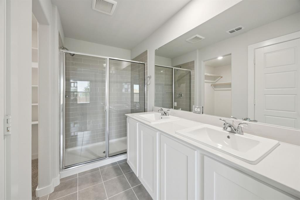 853 Rockcloud Drive Haslet, TX 76052 - Photo 13 of 27 Primary Bathroom in the Hadley home plan by Trophy Signature Homes – REPRESENTATIVE PHOTO