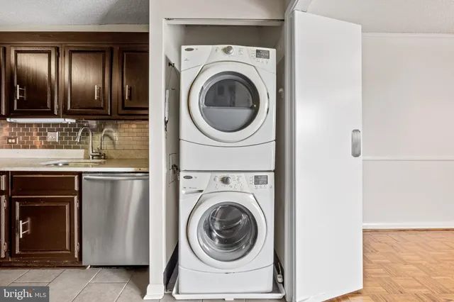 a view of swimming pool with outdoor seating and plants