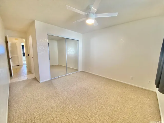 an empty room with a bathroom