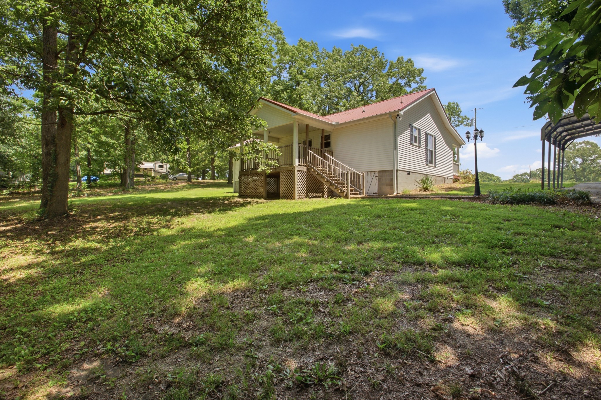 1466 West Grab Creek Road Dickson, TN 37055 - Photo 29 of 30 a front view of a house with yard and green space
