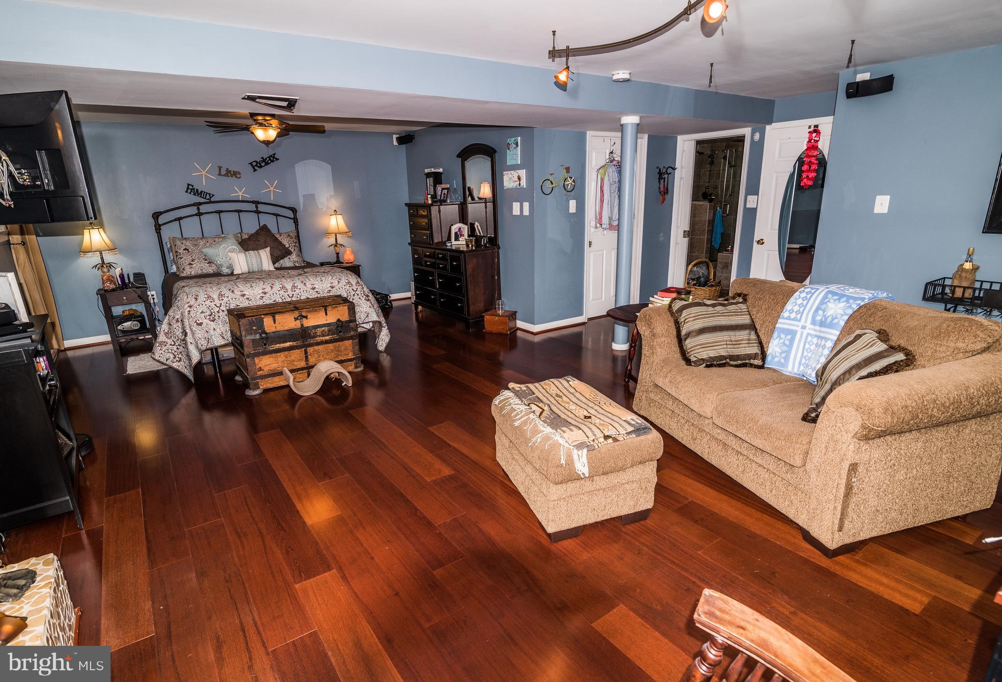 11706 Rivershore Drive Dunkirk, MD 20754 - Photo 21 of 71 a living room with furniture and a wooden floor