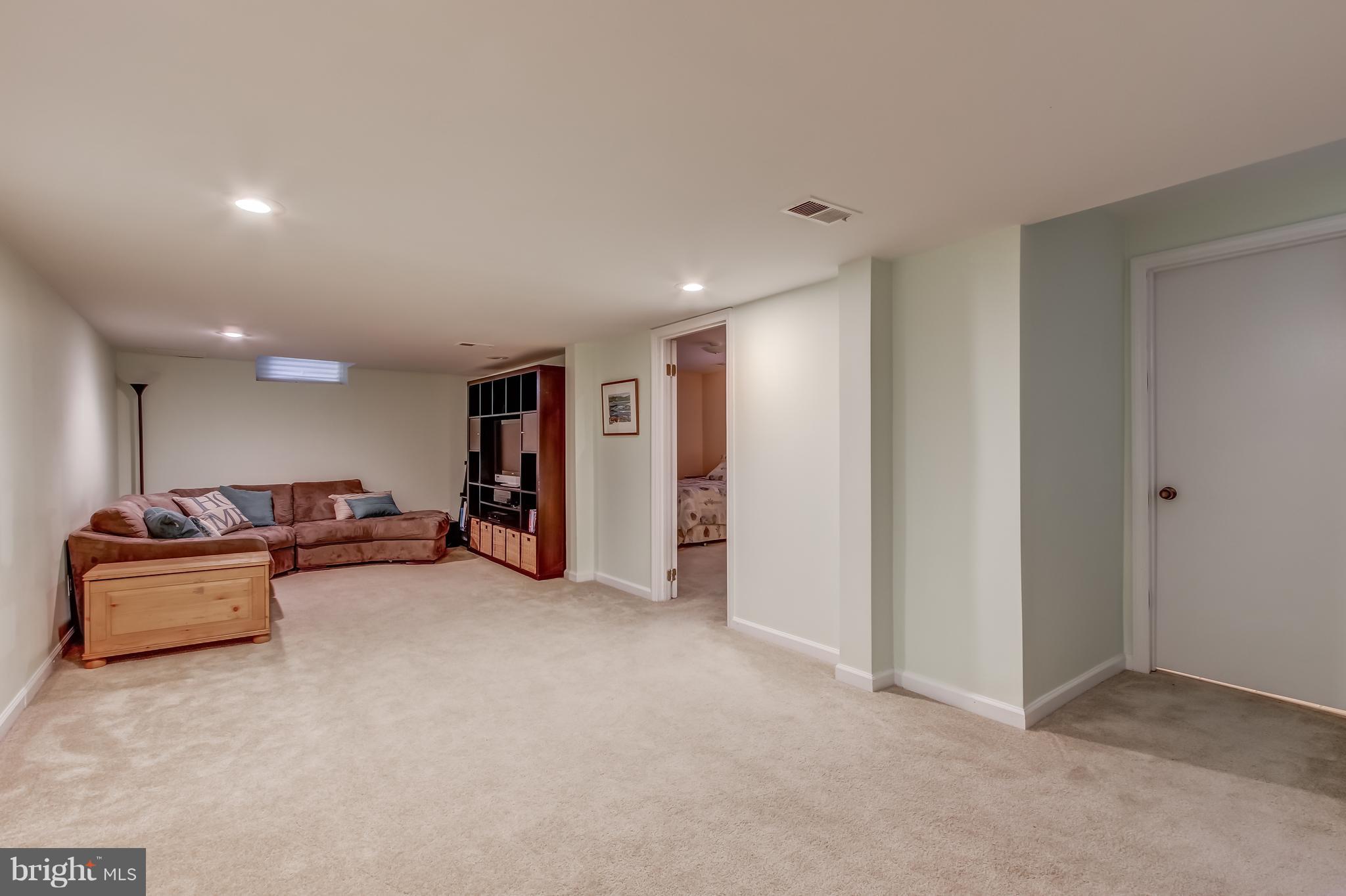 807 Lanark Way Silver Spring, MD 20901 - Photo 14 of 19 Spacious lower level recreation room