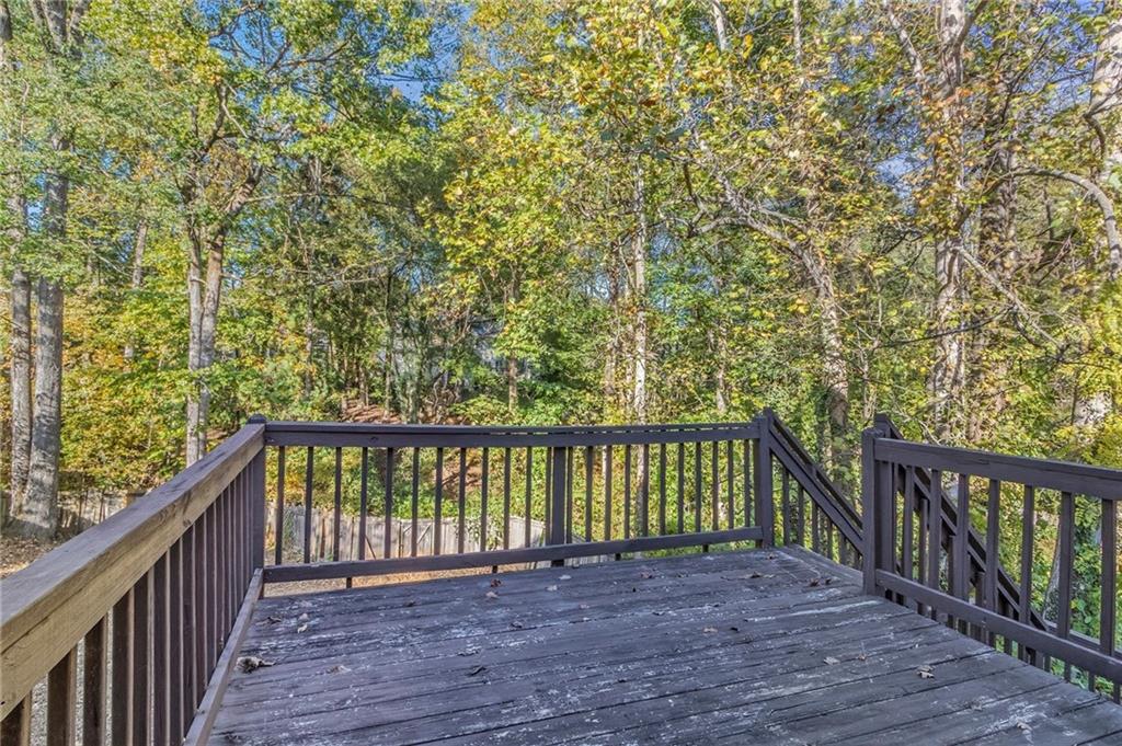 715 Welford Road Northwest Suwanee, GA 30024 - Photo 42 of 50 a view of balcony with wooden floor