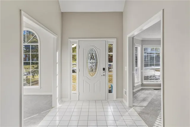 an empty room with windows