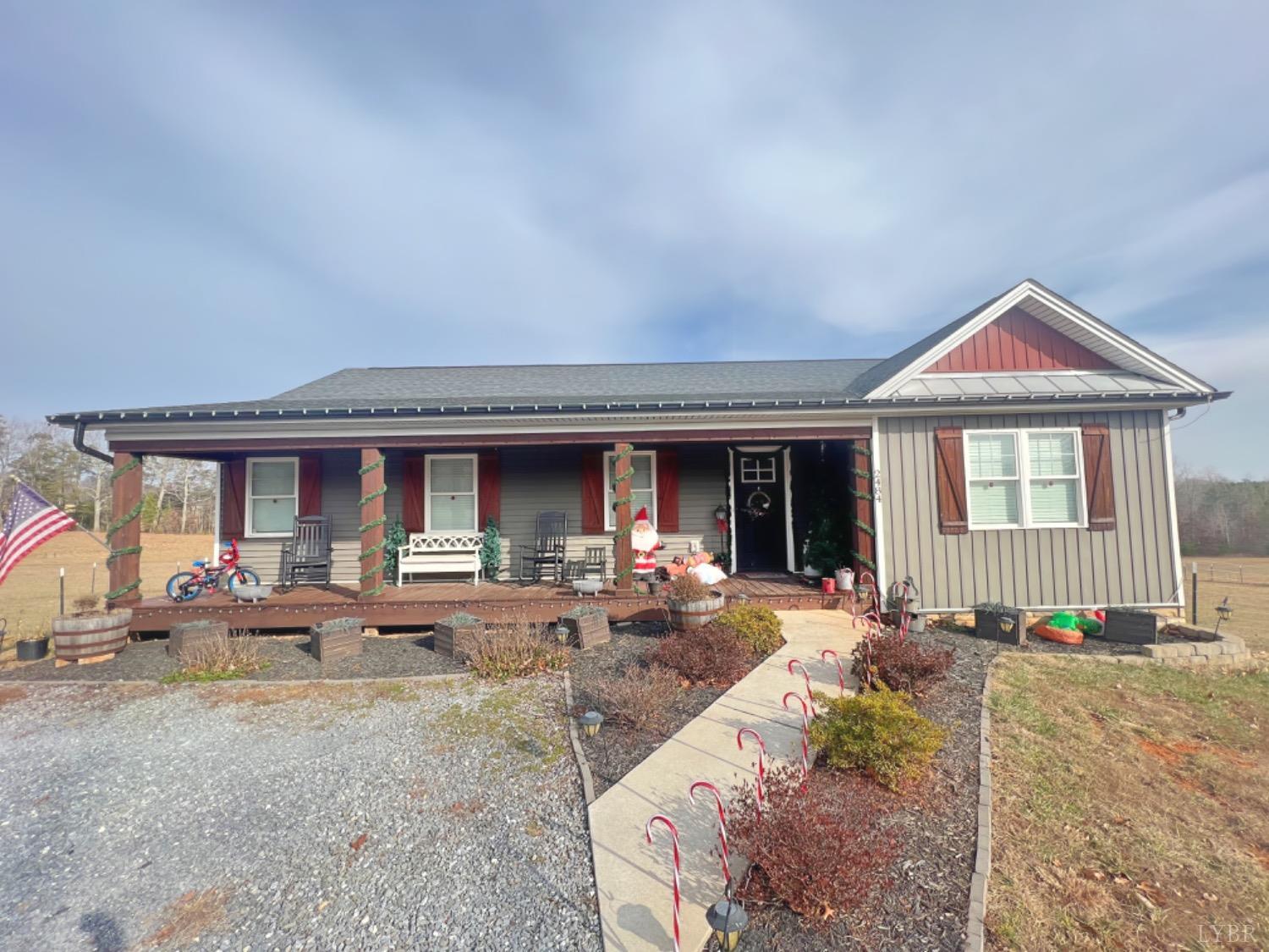 2484 Red House Road Rustburg, VA 24588 - Photo 2 of 29 a view of a house with backyard sitting area and tub
