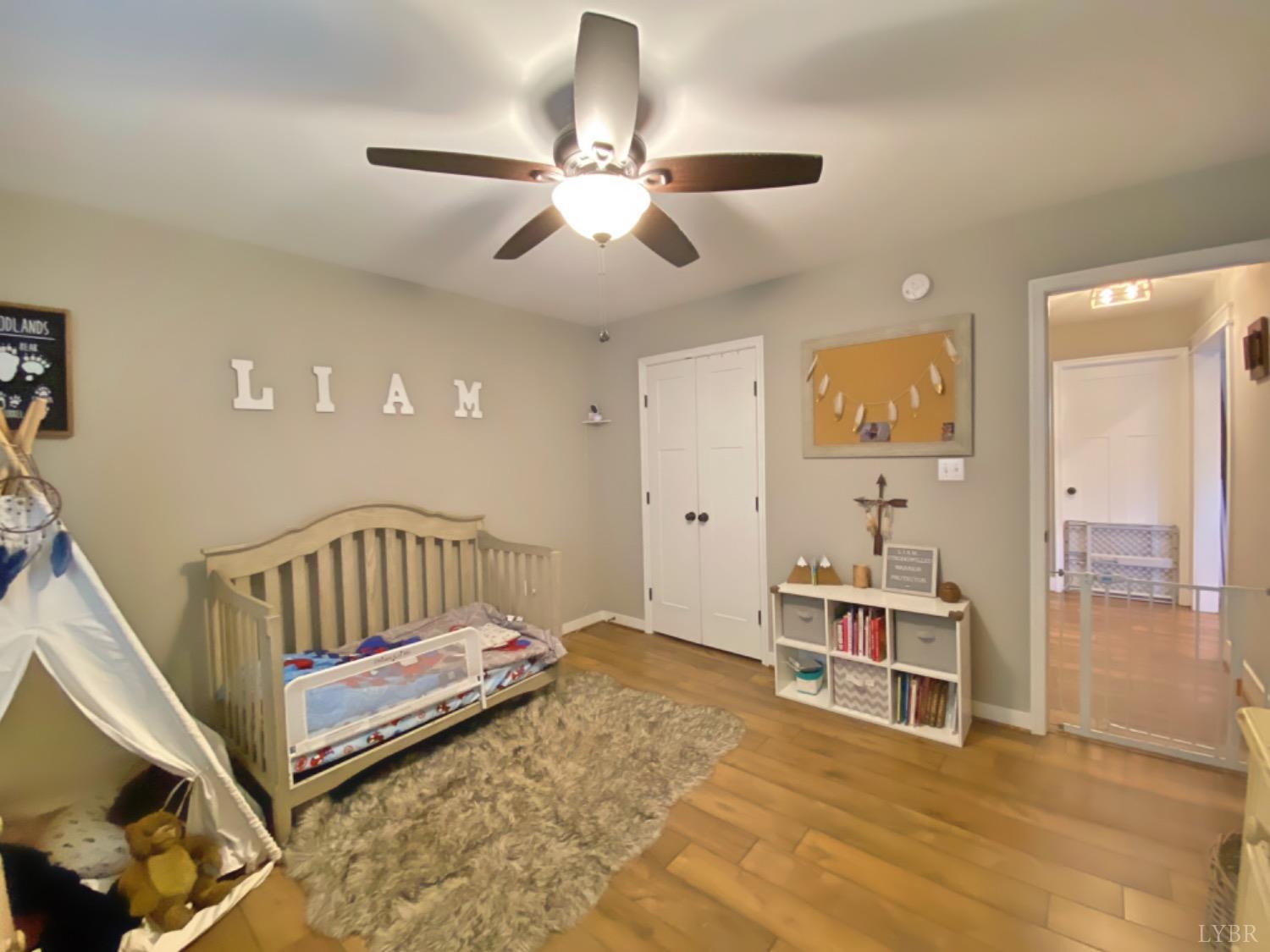 2484 Red House Road Rustburg, VA 24588 - Photo 28 of 29 a bedroom with furniture and a window