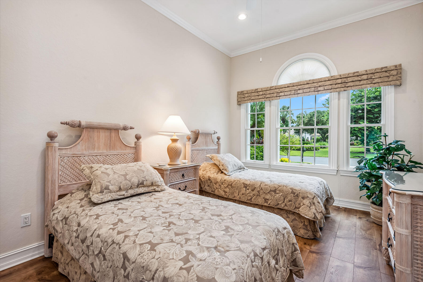 8499 Mallards Way Naples, FL 34114 - Photo 17 of 50 a bedroom with two beds and a large window