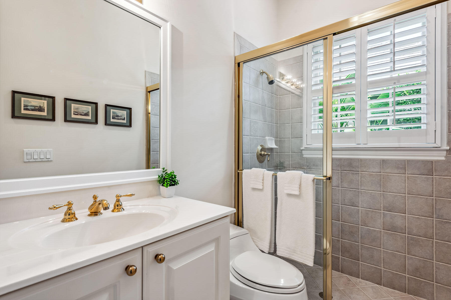 8499 Mallards Way Naples, FL 34114 - Photo 18 of 50 a bathroom with a sink a toilet and shower