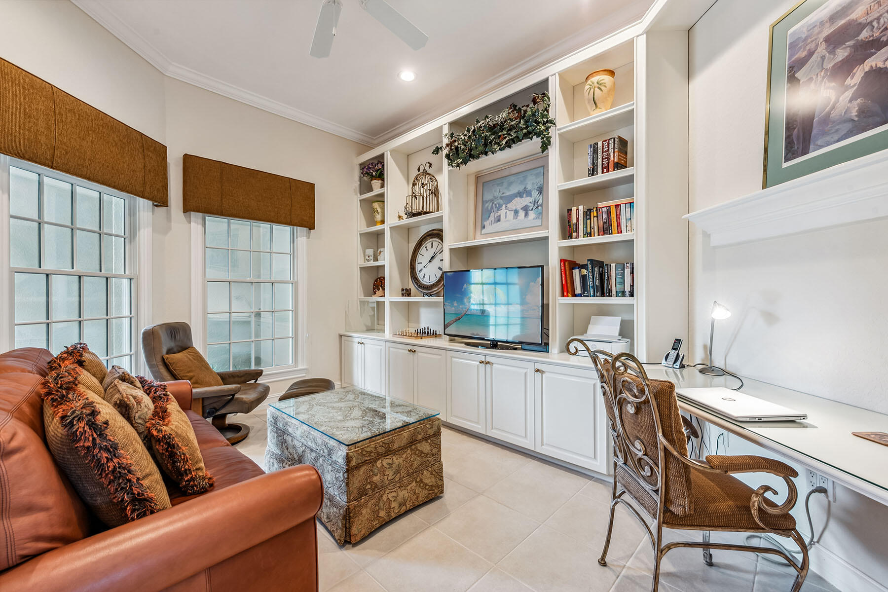 8499 Mallards Way Naples, FL 34114 - Photo 19 of 50 a living room with furniture and large window