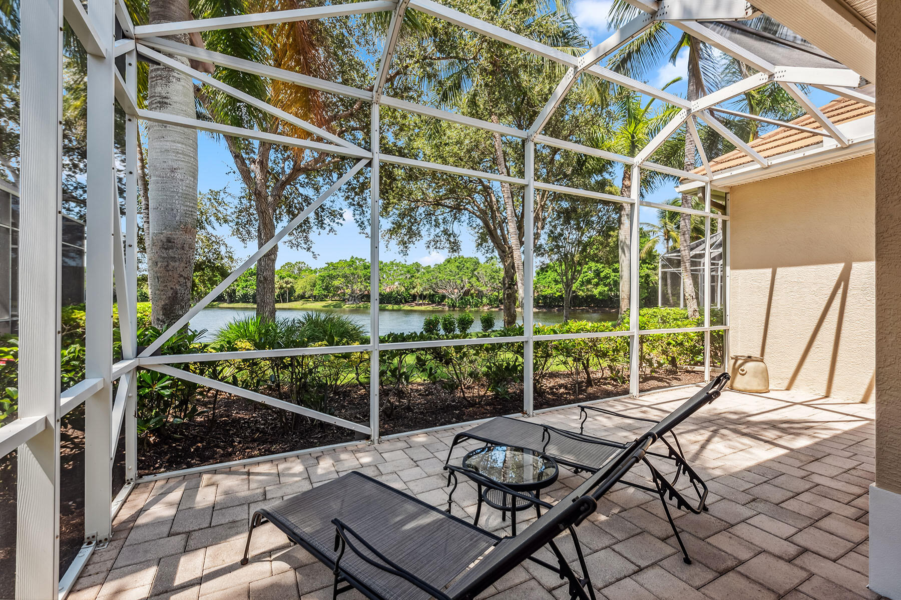8499 Mallards Way Naples, FL 34114 - Photo 22 of 50 a view of sitting area with furniture and floor to ceiling window