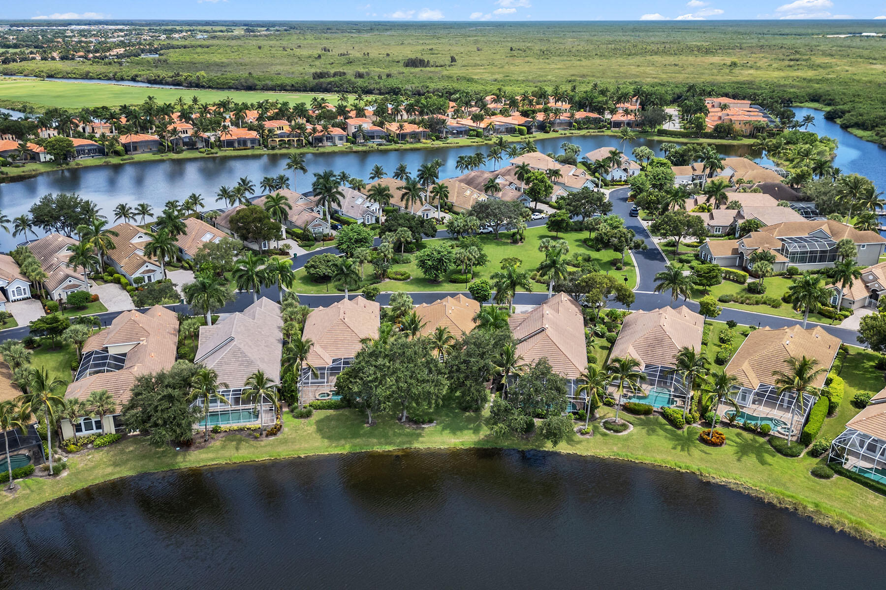 8499 Mallards Way Naples, FL 34114 - Photo 33 of 50 an aerial view of residential houses with outdoor space and lake view