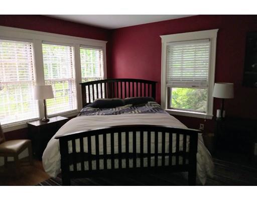 150 Moffat Road Newton, MA 02468 - Photo 14 of 18 a bed sitting in a bedroom next to a window