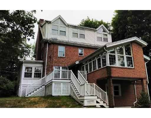 150 Moffat Road Newton, MA 02468 - Photo 16 of 18 a front view of a house with a yard