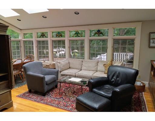 150 Moffat Road Newton, MA 02468 - Photo 5 of 18 a living room with furniture and a large window