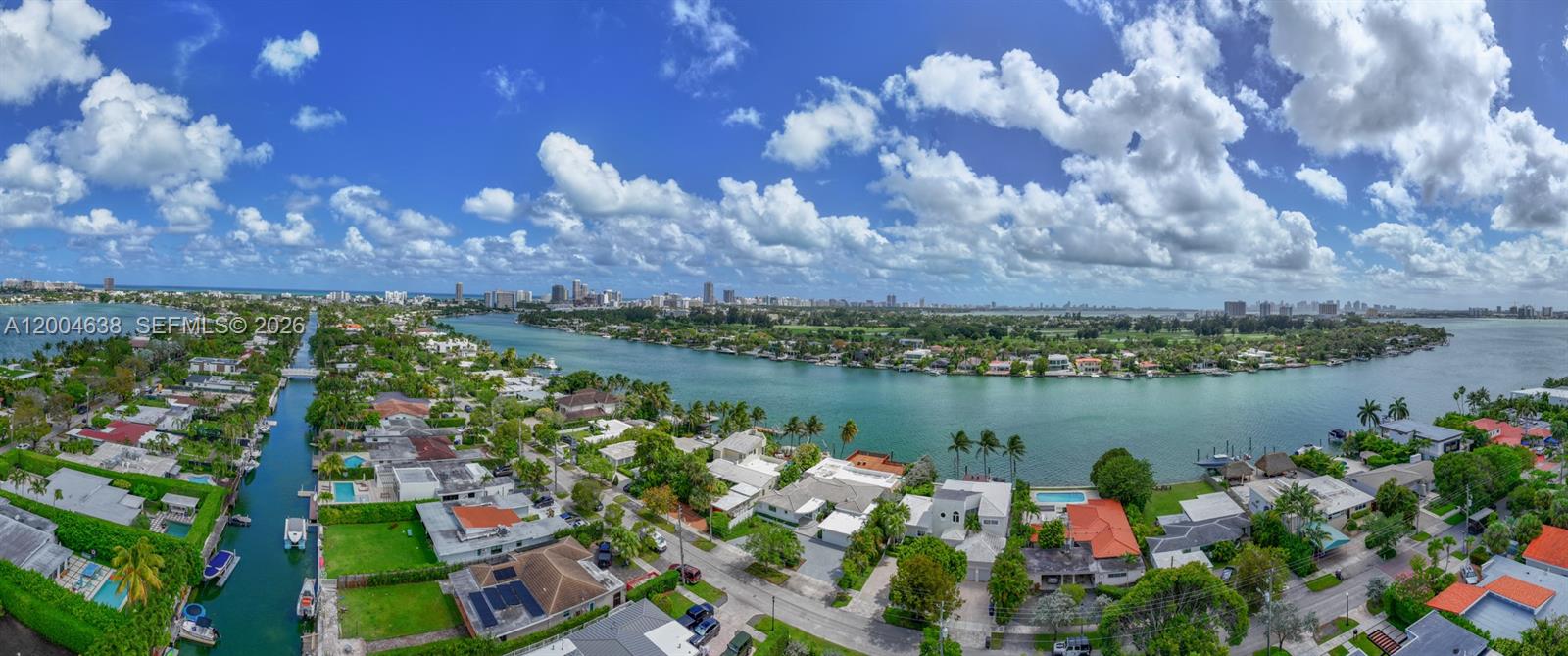 1690 Daytonia Road Miami Beach, FL 33141 - Photo 16 of 88 a view of a lake with a city