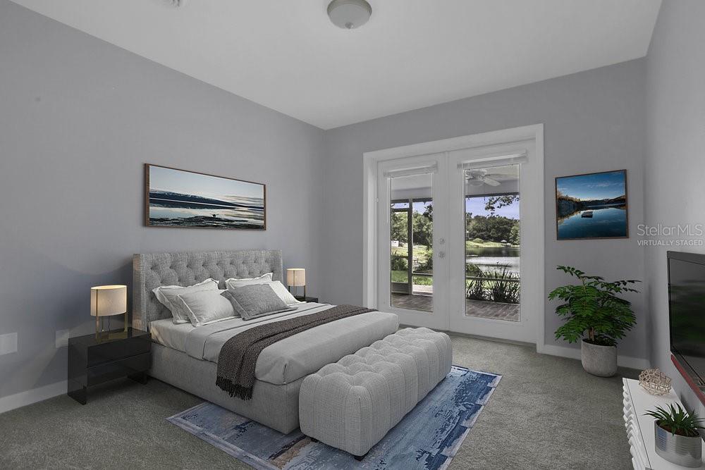 3605 Pershing Avenue Orlando, FL 32812 - Photo 16 of 35 a bedroom with bed and a potted plant