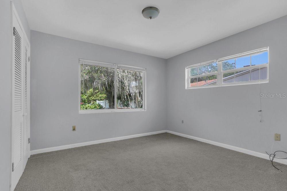 3605 Pershing Avenue Orlando, FL 32812 - Photo 17 of 35 an empty room with a window