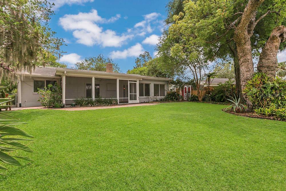 3605 Pershing Avenue Orlando, FL 32812 - Photo 30 of 35 a view of house with a backyard