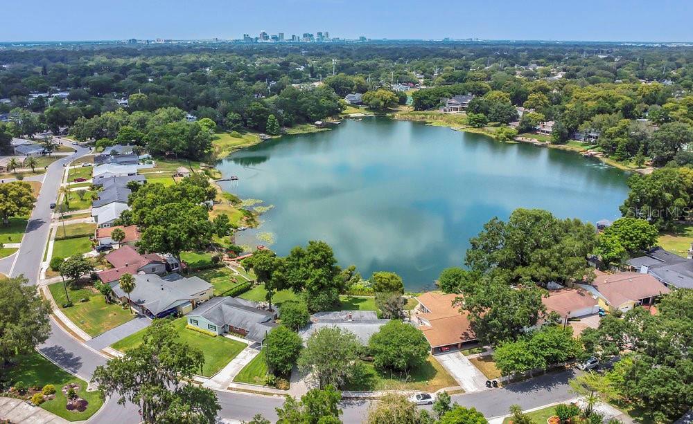 3605 Pershing Avenue Orlando, FL 32812 - Photo 31 of 35 an aerial view of a house with a lake view