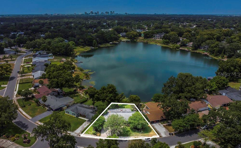 3605 Pershing Avenue Orlando, FL 32812 - Photo 32 of 35 an aerial view of residential house with outdoor space and lake view