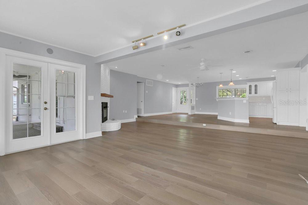 3605 Pershing Avenue Orlando, FL 32812 - Photo 10 of 35 a view of empty room with wooden floor