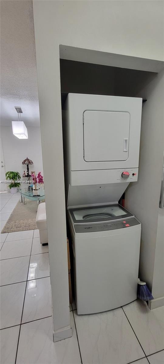 7121 Southwest 129th Avenue, Unit 5 Miami, FL 33183 - Photo 10 of 19 a utility room with dryer and washer
