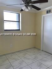 3121 Northwest 103rd Street, Unit 3 Miami, FL 33147 - Photo 4 of 6 a view of a room with window